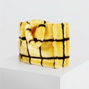 Stand Studio “Lolita” tote bag in yellow and black grid faux fur